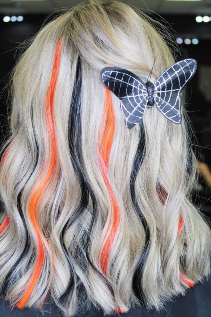 Platinum Hair With Bold streaks of Orange and Black 