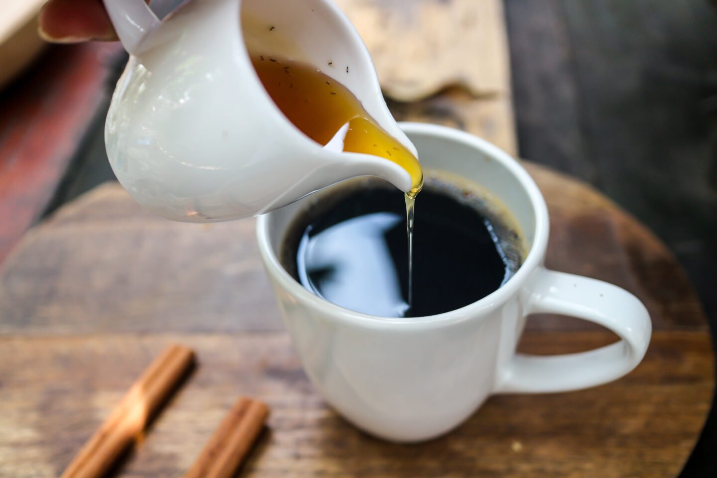 Black,Coffee,Mug,In,White,Color,On,Wooden,Table,With