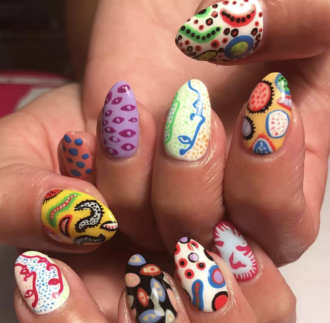 Pattern mixing almond shaped nails