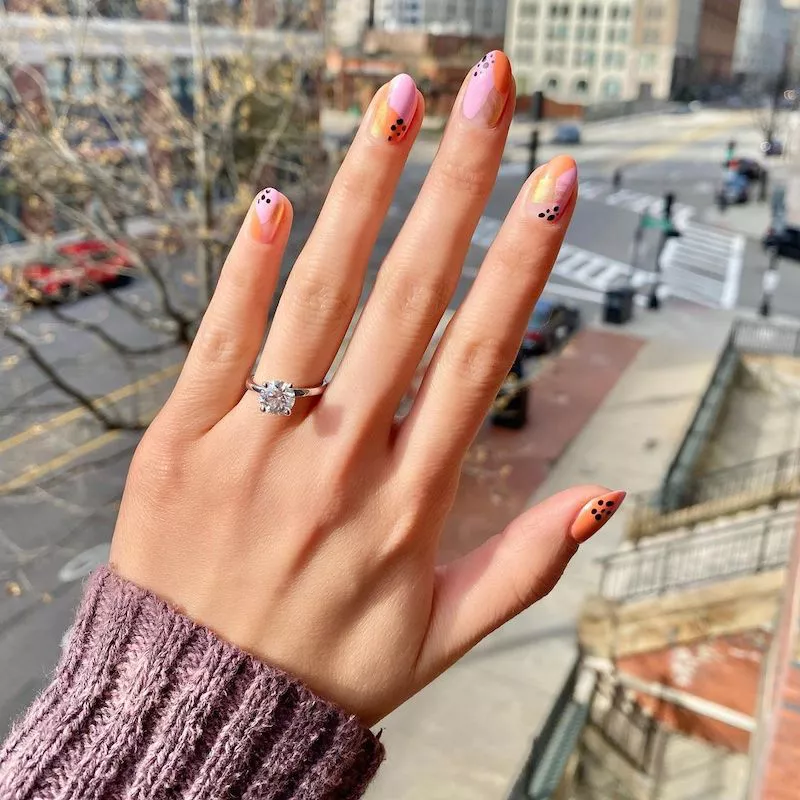 Pink and orange short almond nails