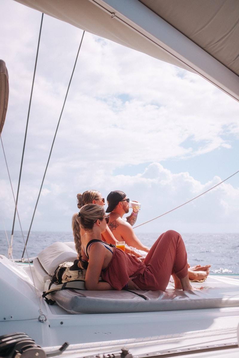 Two women sitting on a boat in the ocean