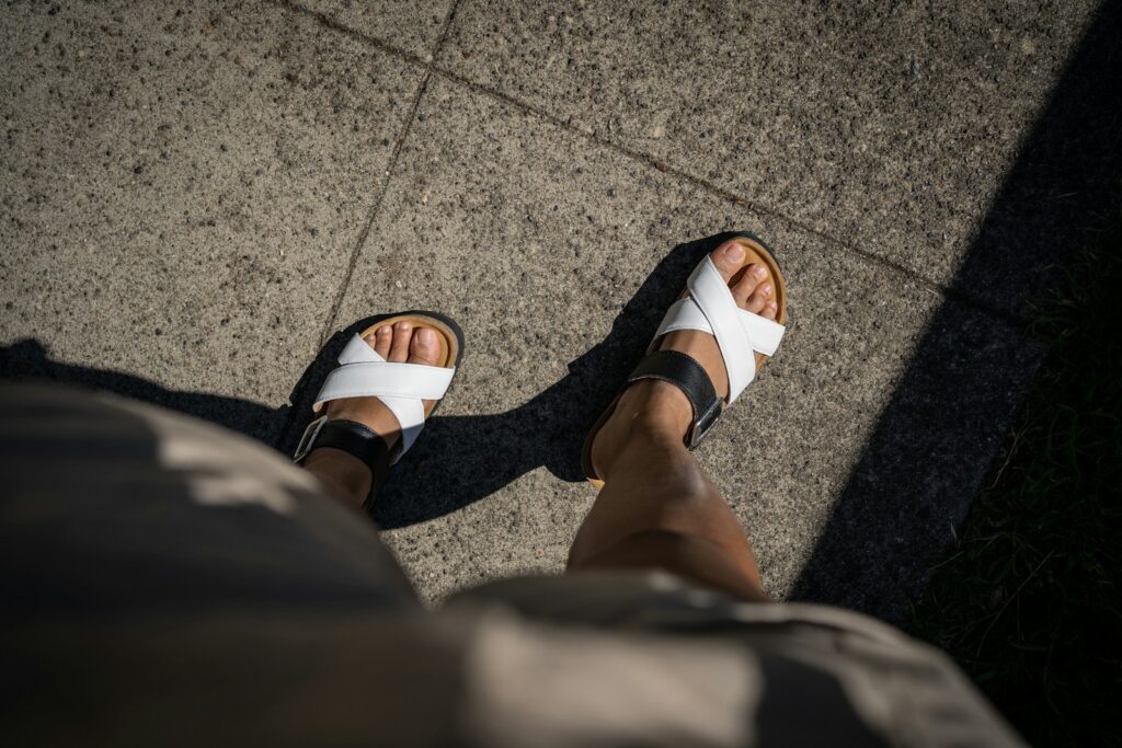 a pair of feet with sandals