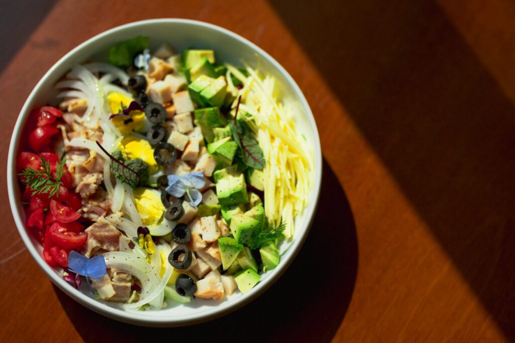 vegetable salad in white ceramic bowl