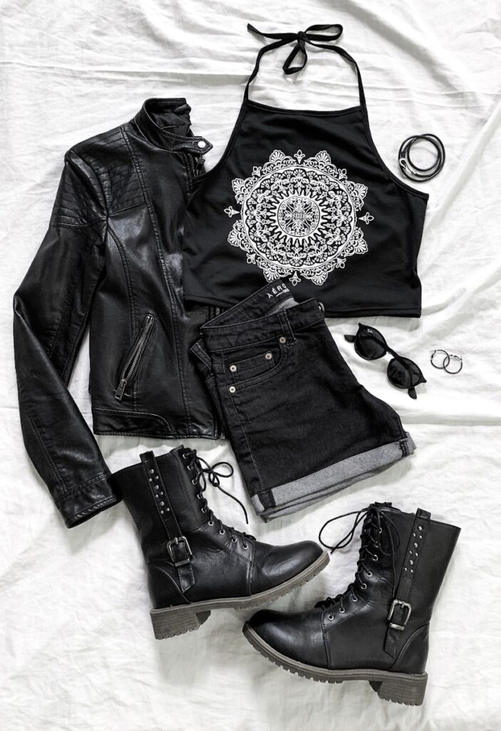 black leather biker boots, jacket and black denim shorts
