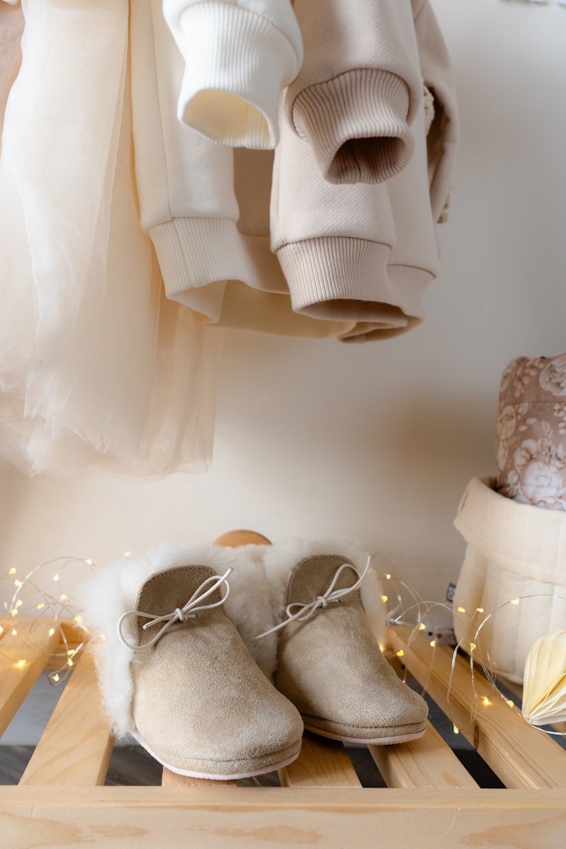 A pair of shoes sitting on top of a wooden shelf