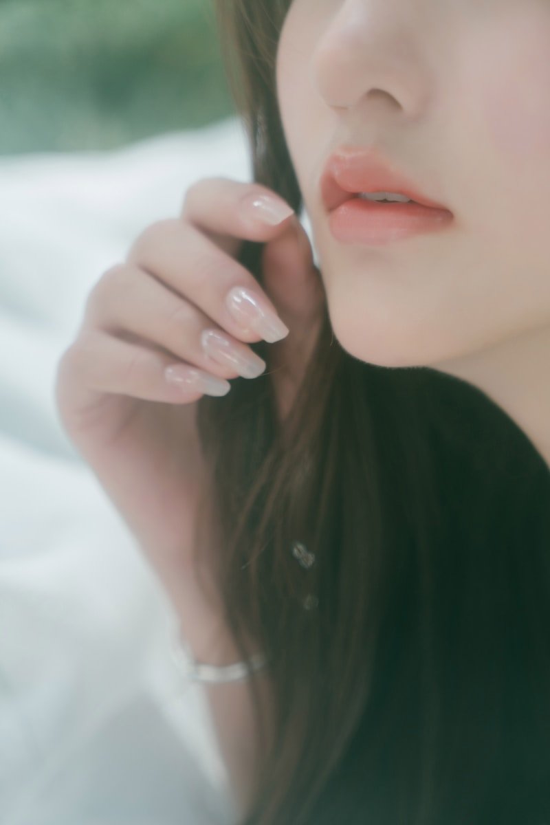 A close up of a person with a cell phone