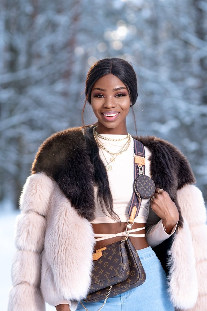 Cozy Yet Chic: 15 Winter 2026 Outfit Ideas for Every Occasion woman in white and brown fur coat