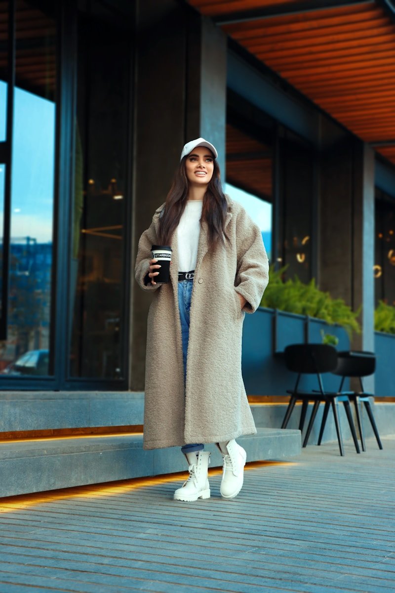 10 Ways to Style a Long Coat This Winter a person in a long coat