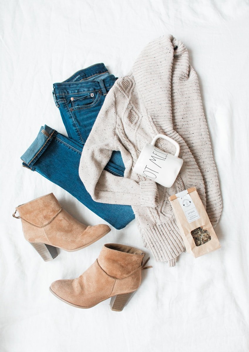 Back-to-School Outfits for Girls Who Want Comfort and Style gray cardigan, blue jeans, and pair of brown chunky heeled shoes